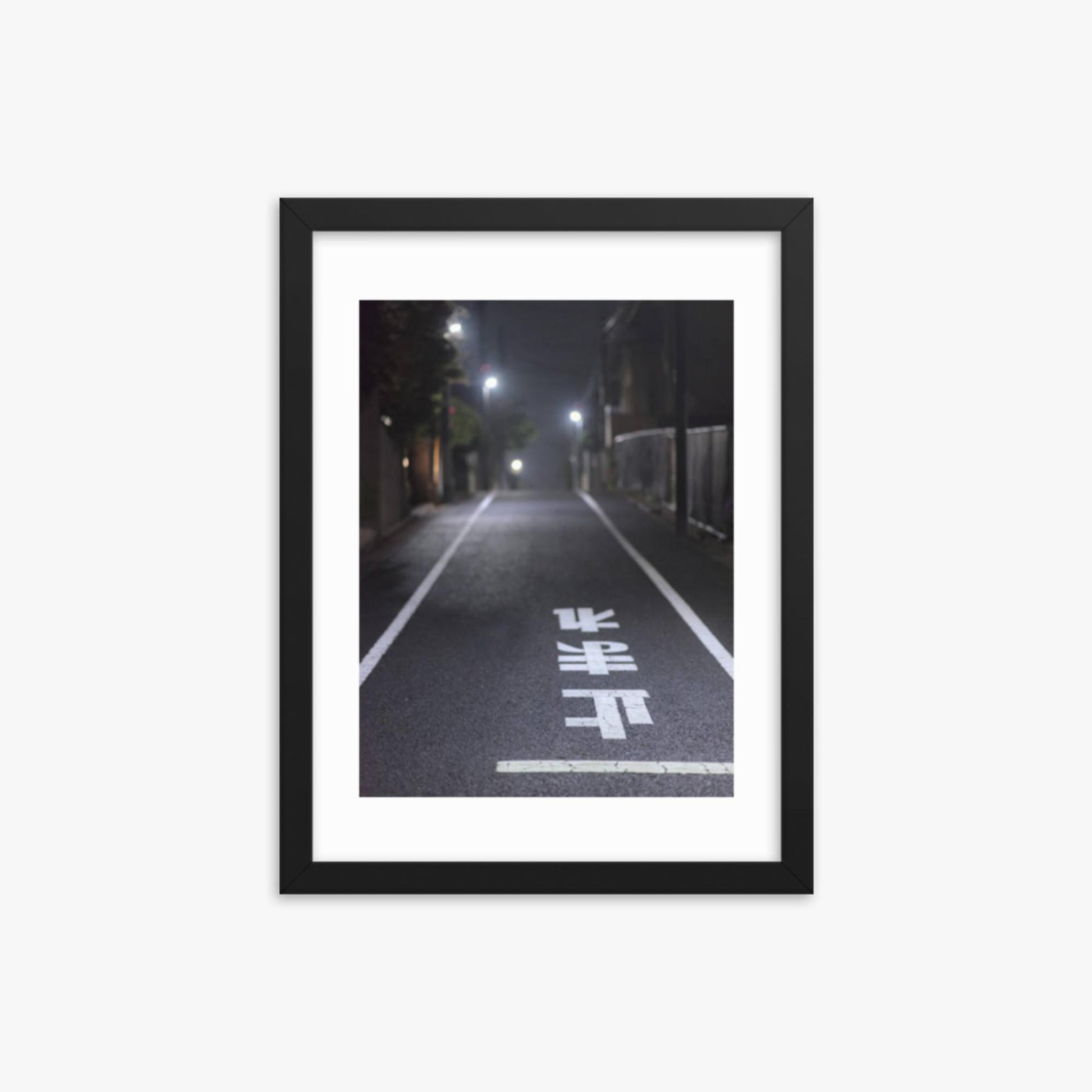 Typical road by night with the stop sign in Japanese written on the ground 12x16 in Poster With Black Frame